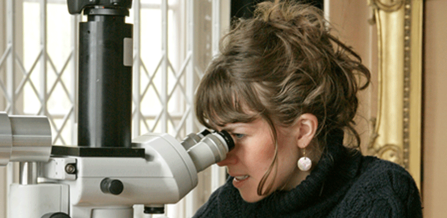 Student at microscope